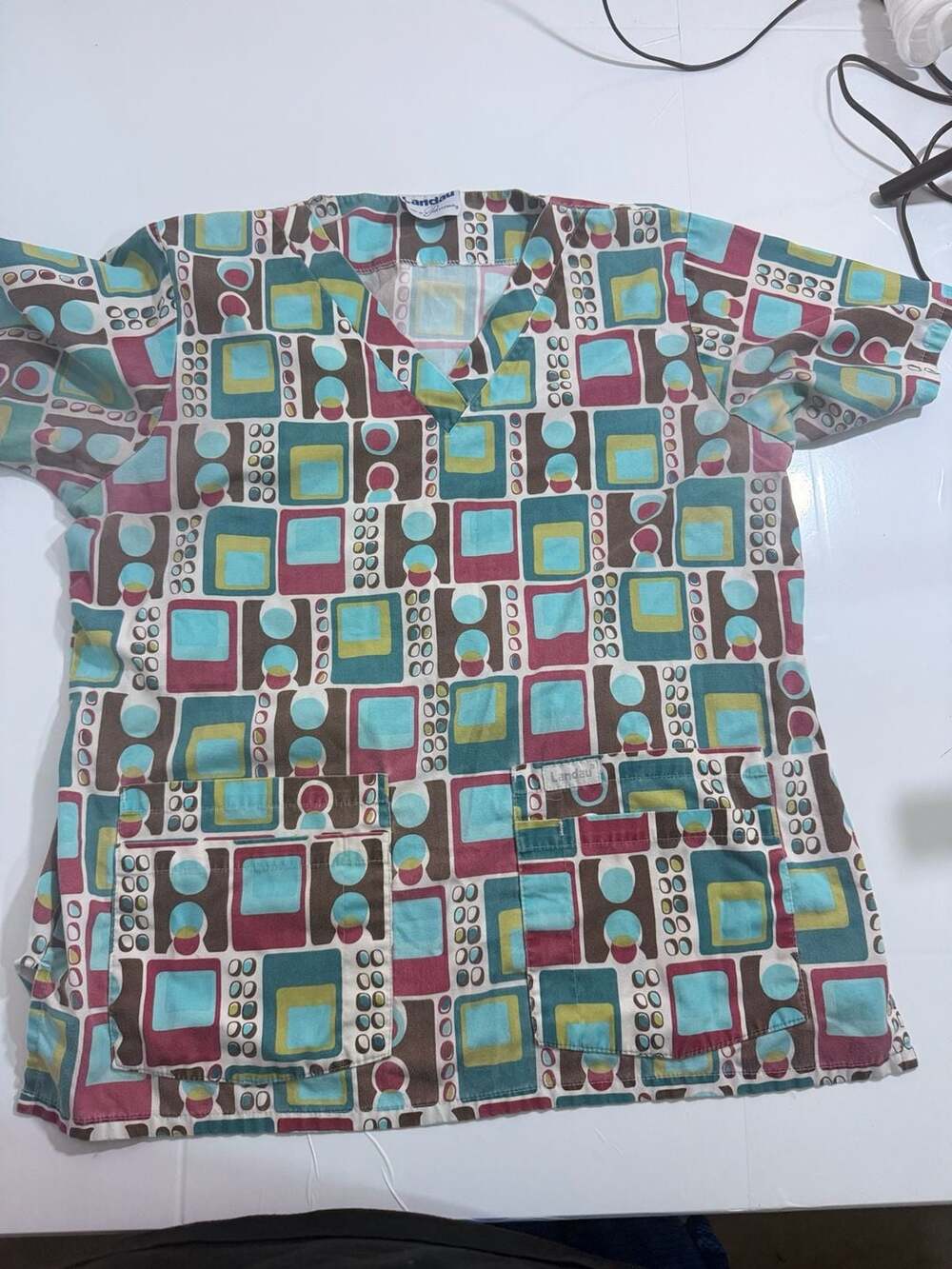 Landau Geometric Scrub Top Multi V-Neck Short Sleeve Pockets